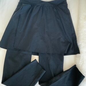Spanx ankle length leggings with skirt attached.